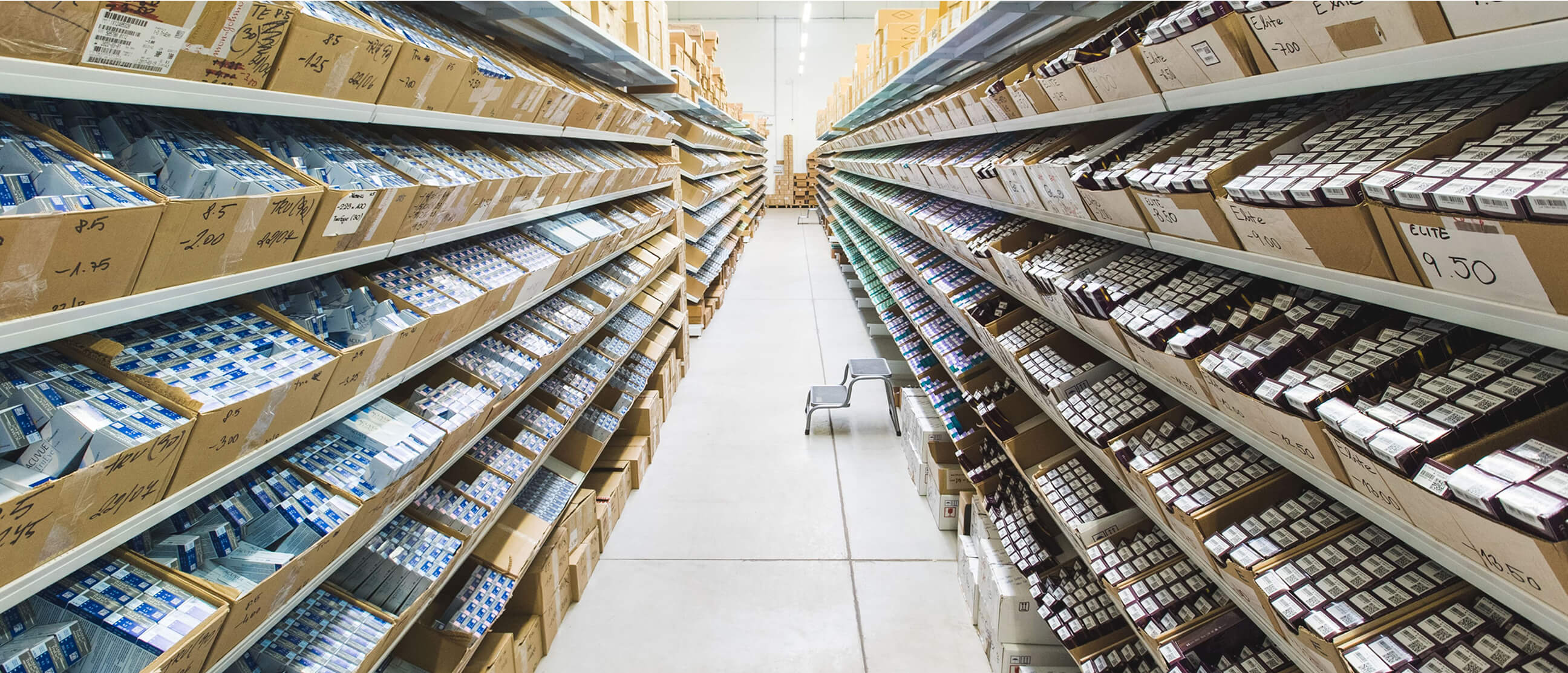 A row in a warehouse with many types of contact lenses.