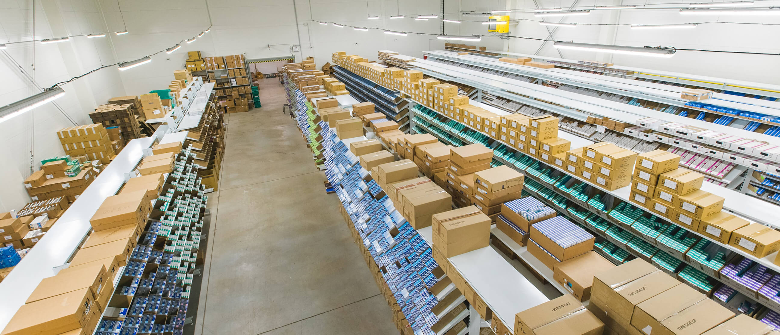Bird view of a warehouse filled with boxes.